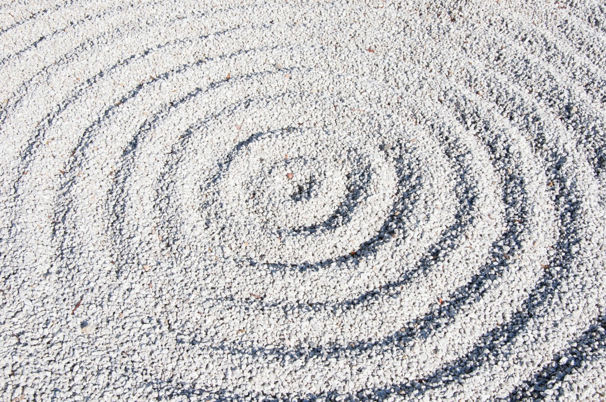Concentric circles in sand.